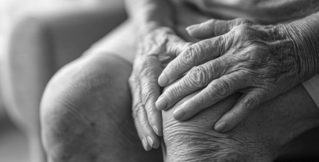 images of hands on knee - arthritis in the knee